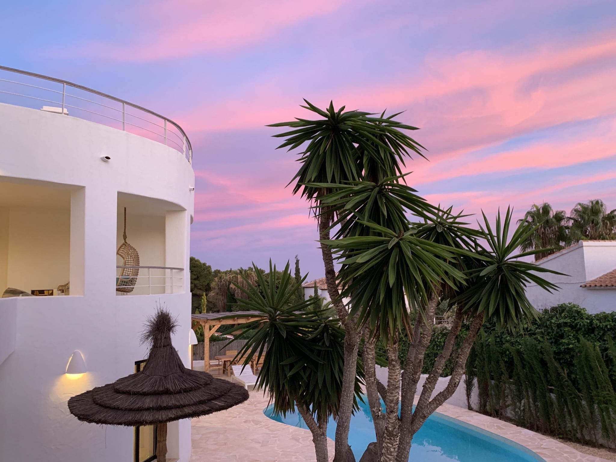 investment property in Spain with pool during sunset